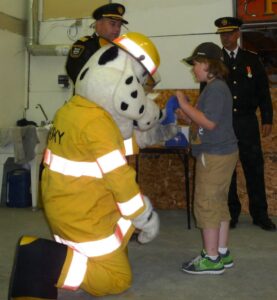 Sparky handing out prizes
